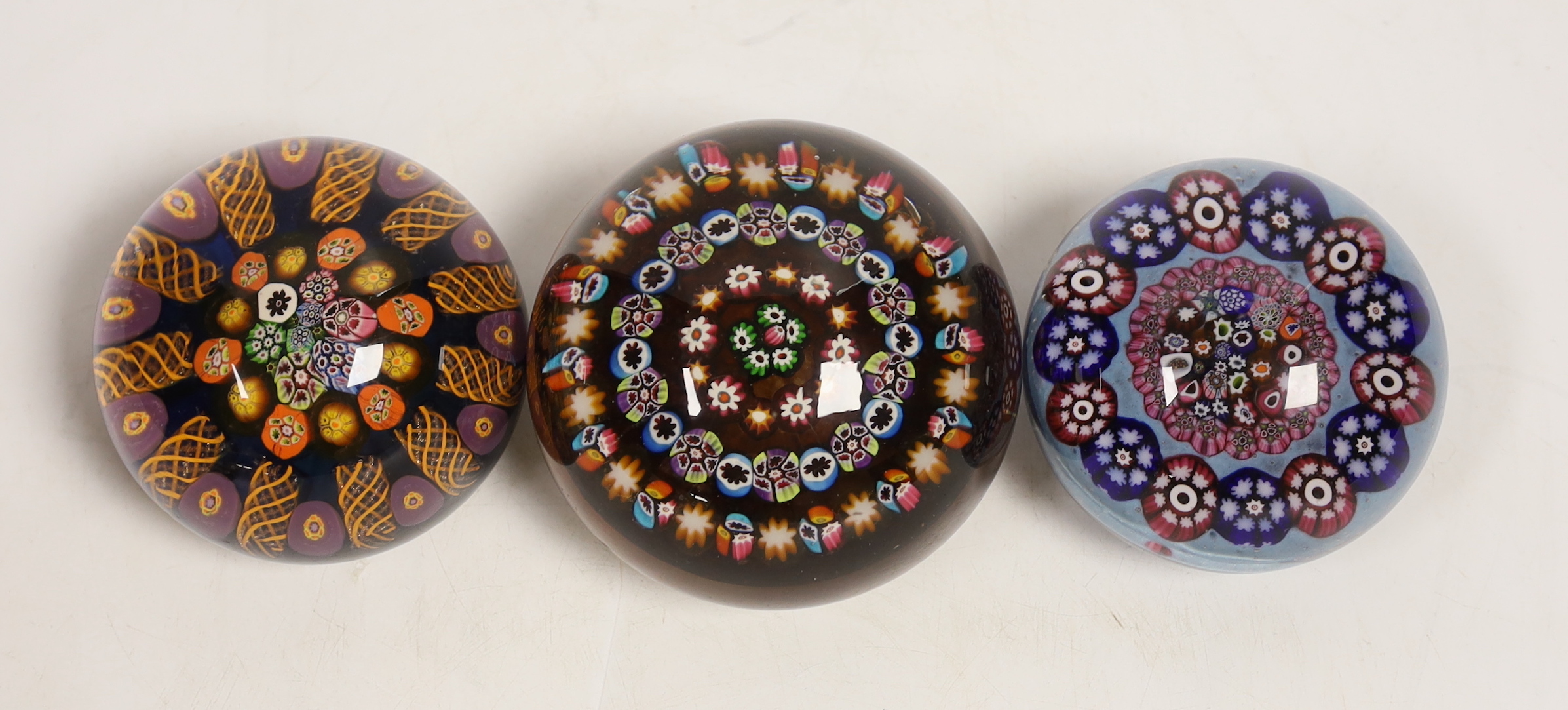 Three paperweights, Perthshire and two others